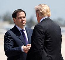 Sen. Marco Rubio greets the president in Miami
