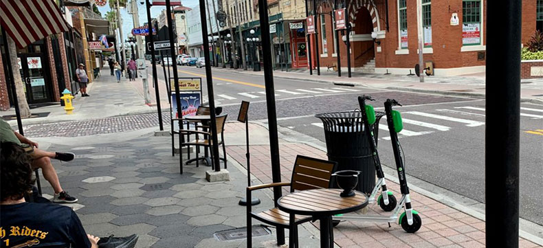 E-scooters are ridden and parked in restricted areas of Ybor City