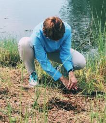 Gwen Graham planting marsh grass Gwen Graham planting marsh grass