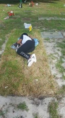 Domonique Brown at her daugher Jada Paige's grave