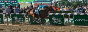 American Pharaoh pulls away