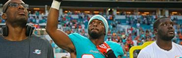 Dolphin Robert Quinn Aug. 9 during the National Anthem