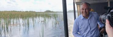 Jay Inslee, self-anointed  "climate champion," mugs it up during an Everglades tour