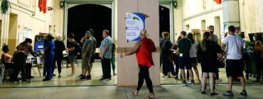 Voters wait to cast ballots in Miami on Nov. 6, 2018