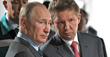 Vladimir Putin and Gazprom CEO Alexei Miller