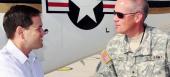 Marco Rubio with a returning serviceman