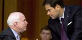 Marco Rubio and John McCain confer in May 2017