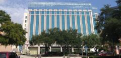 Jim Bleyer labels the Times building "Mismanagement, Inc."